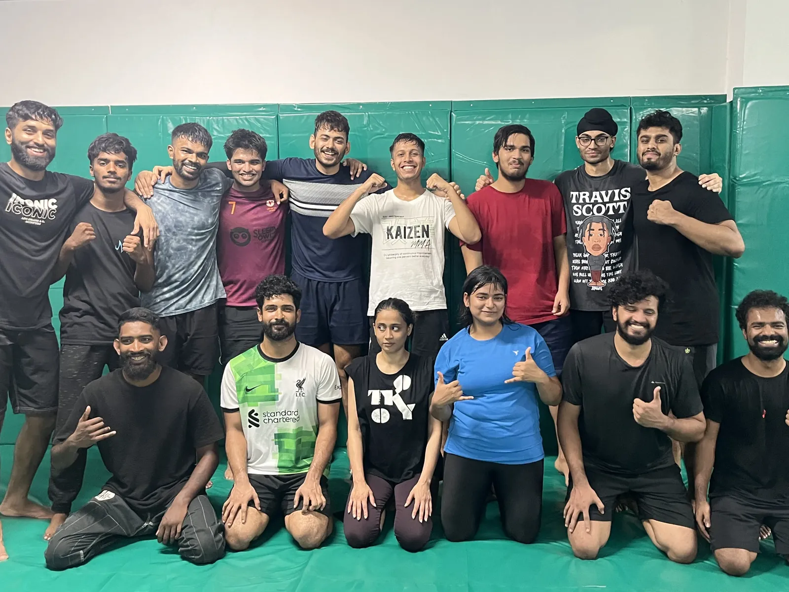 Kaizen MMA training group on the mats
