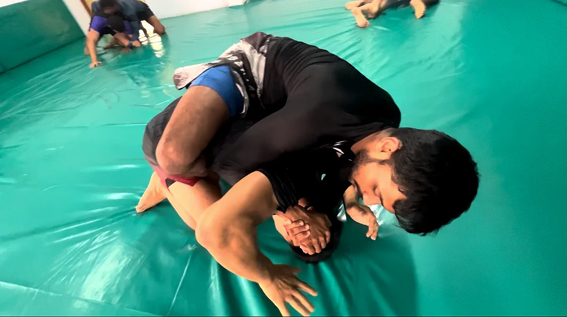 Athletes practising Jiu-Jitsu on Kaizen MMA mats